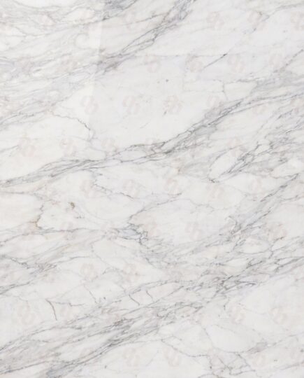 Close-up of Calacatta Vagli Marble slab showing white base and soft grey veins