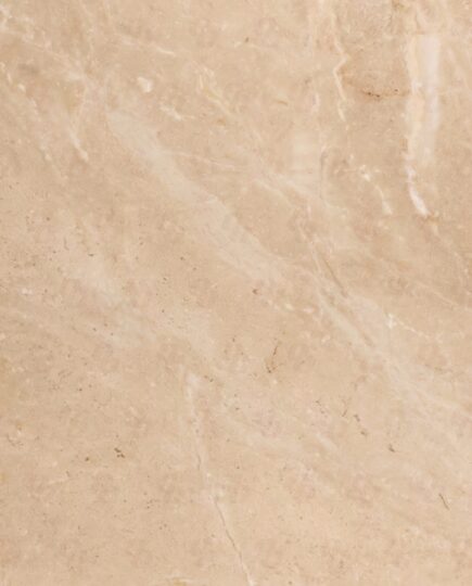 Close-up view of Botticino Crema Marble slab showing light beige background with subtle white veining – ideal for high-end interiors