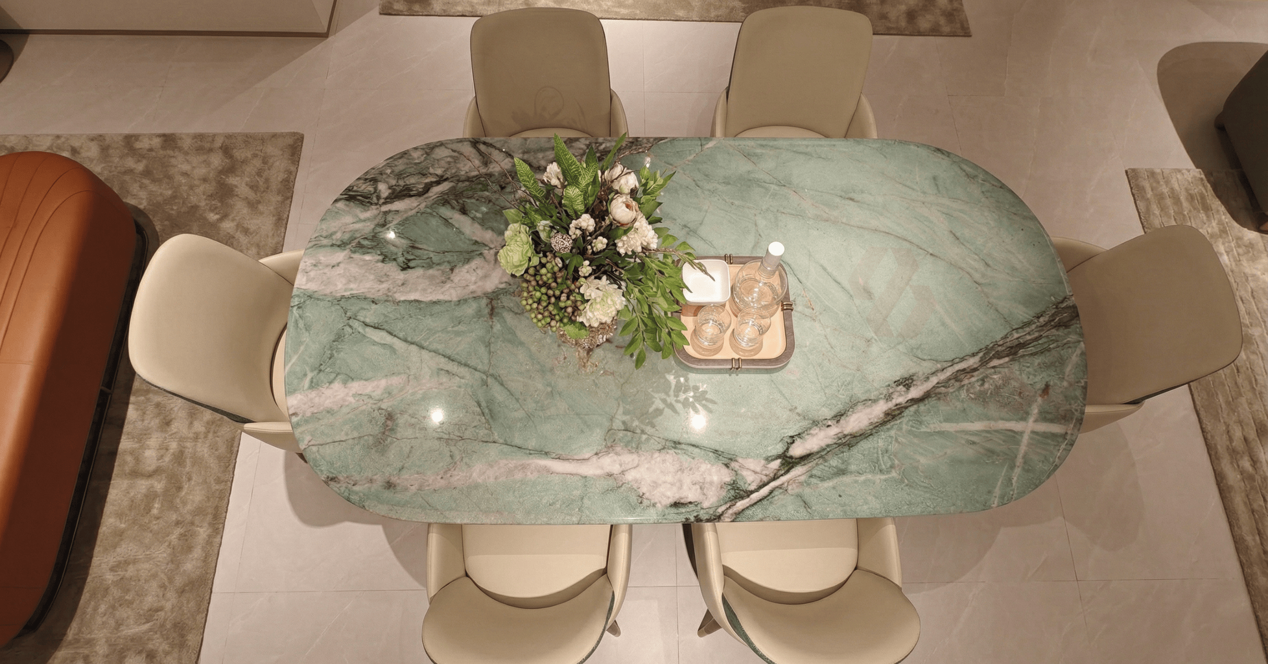 Luxury dining space with green marble Bangalore project by Bhutra Marble