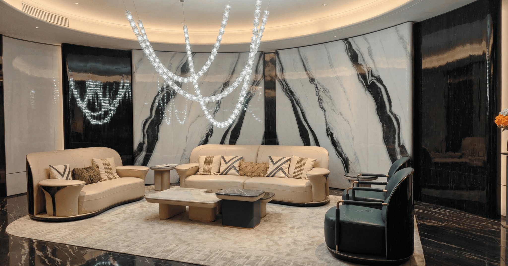 Large-format Panda White Marble feature wall with seating area in Ahmedabad project
