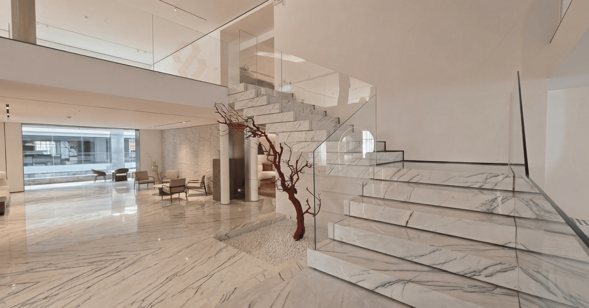 Bhutra Lilac White Marble staircase with glass railing in Mumbai home interior