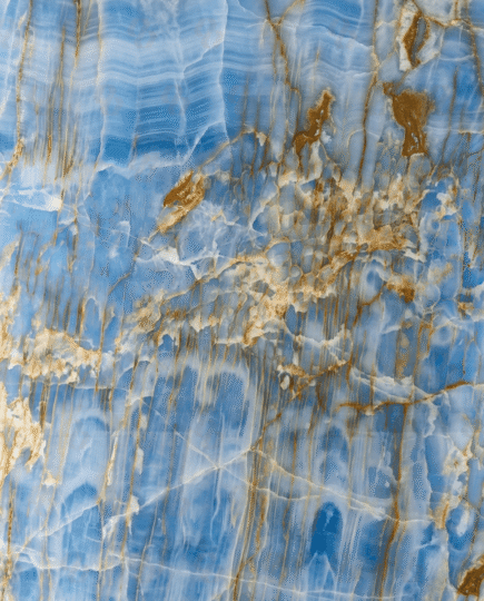 Blue Onyx Marble slab texture with rich blue translucent layers and golden natural veining
