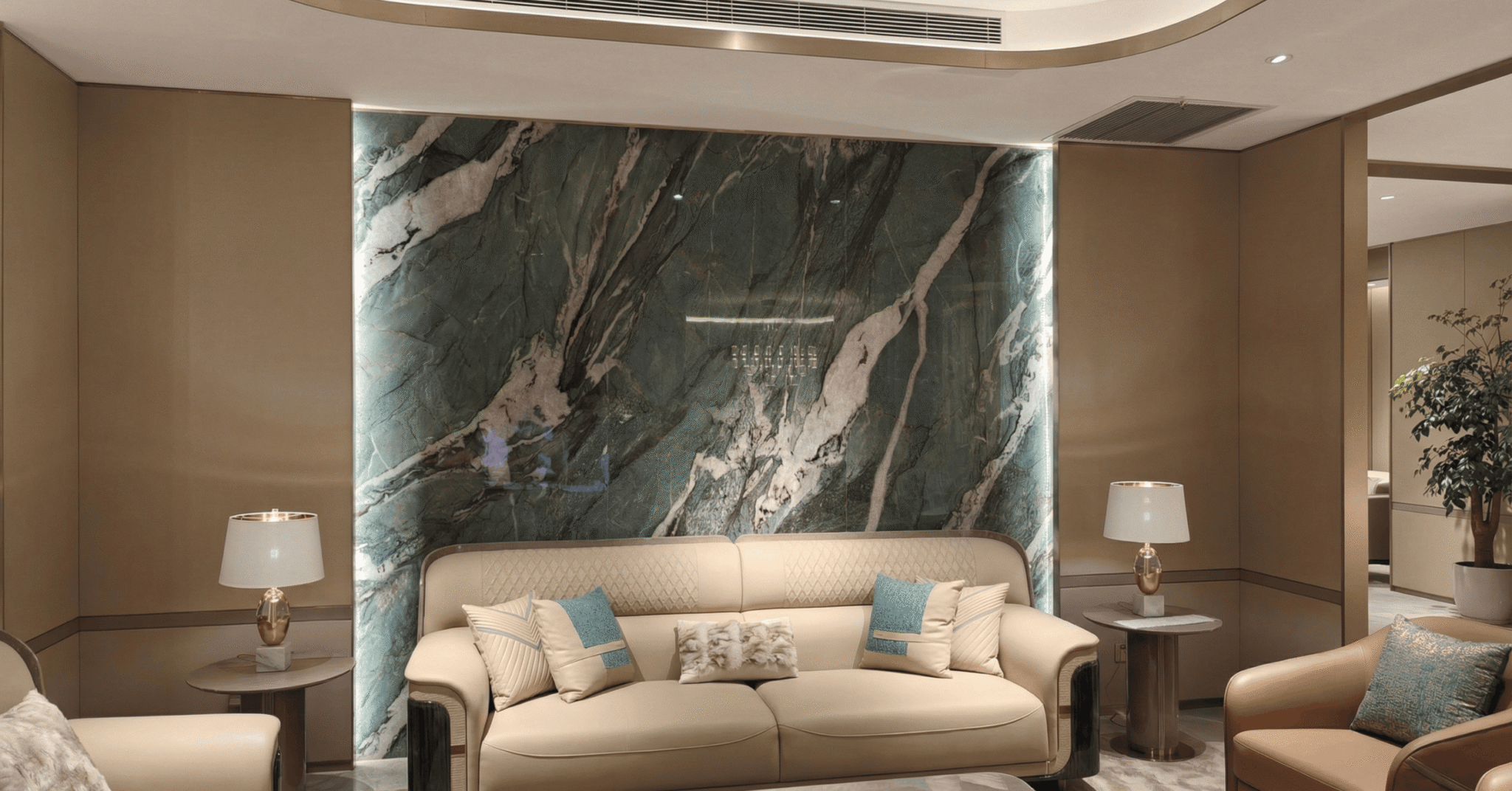 Wide view of Brazilian Quartzite wall application behind sofa in premium interior