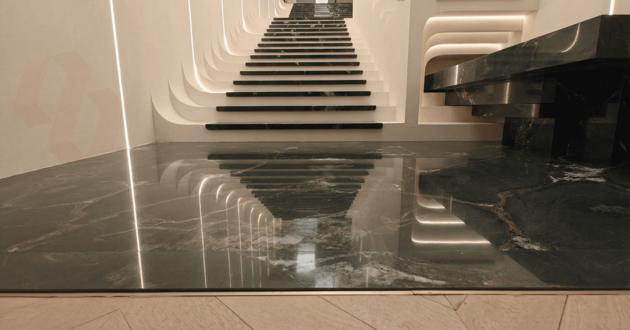 Green Brazilian Quartzite flooring with staircase reflection in Hyderabad interior project