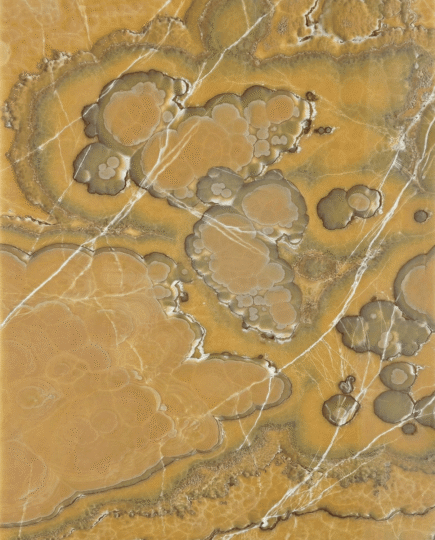 Mexican Onyx Marble slab with golden tones, natural banded patterns and detailed translucent texture