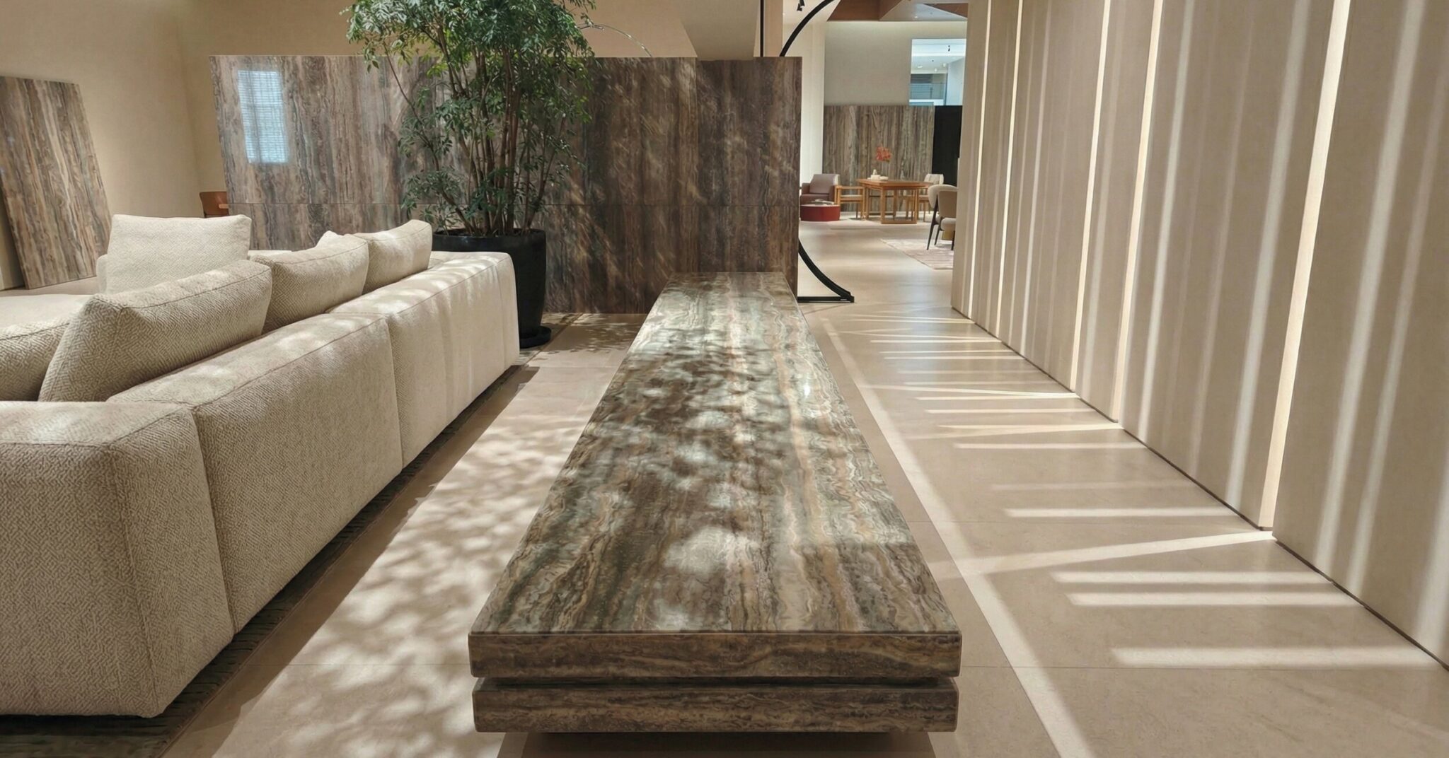 Travertine bench with matching stone panel background in Pune interior