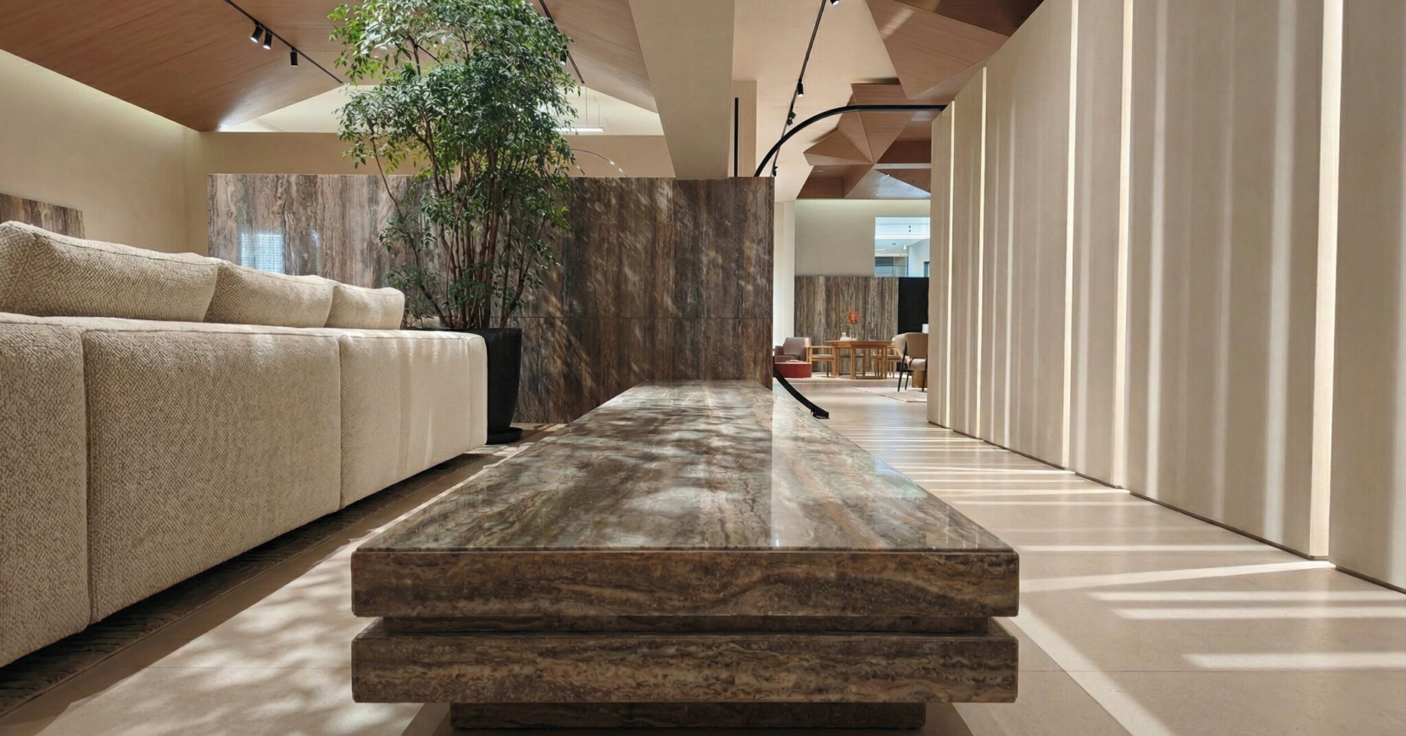 Travertine bench integrated into a luxury interior space in Pune