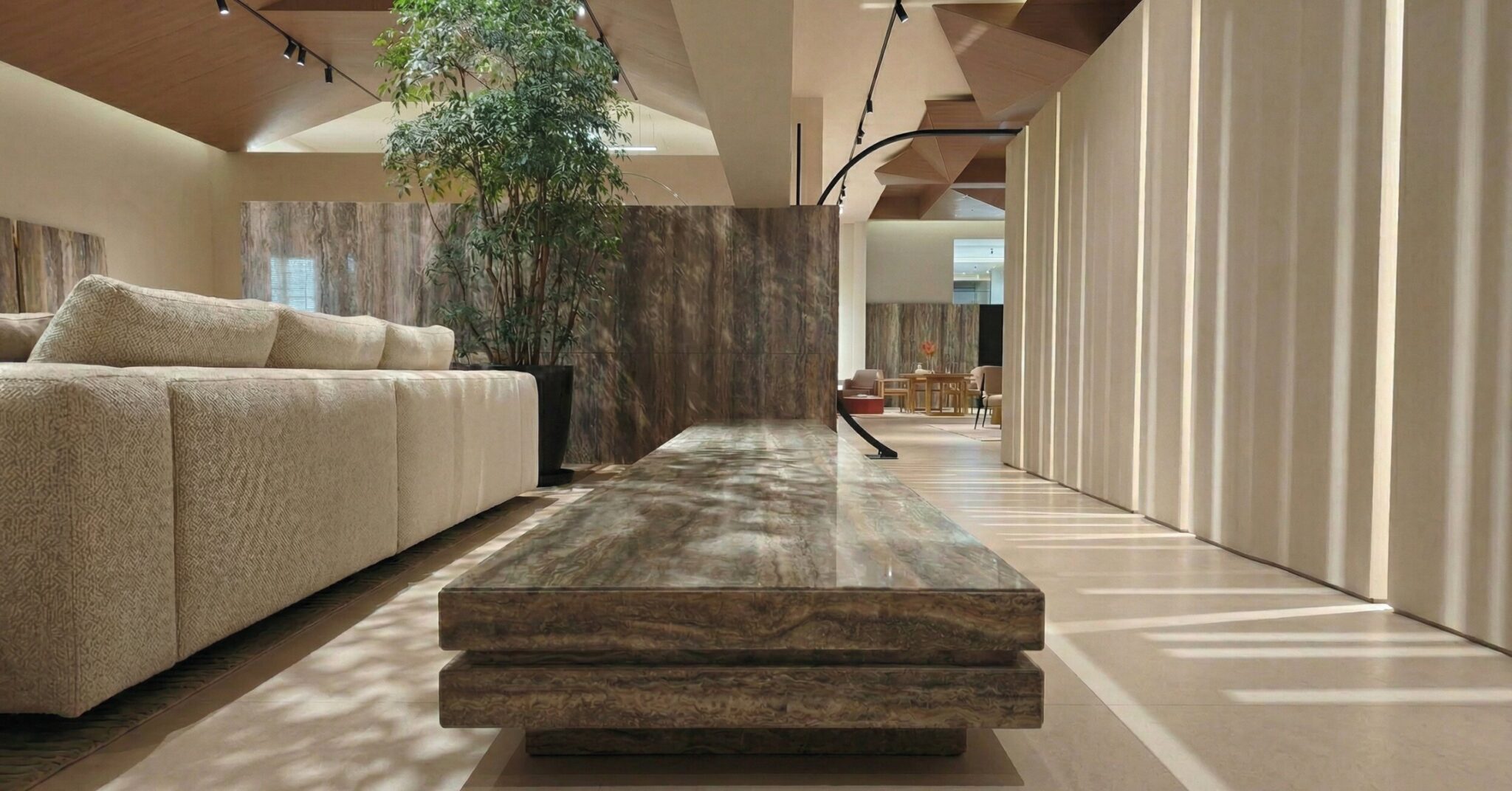 Travertine statement bench in a luxury Pune interior setting