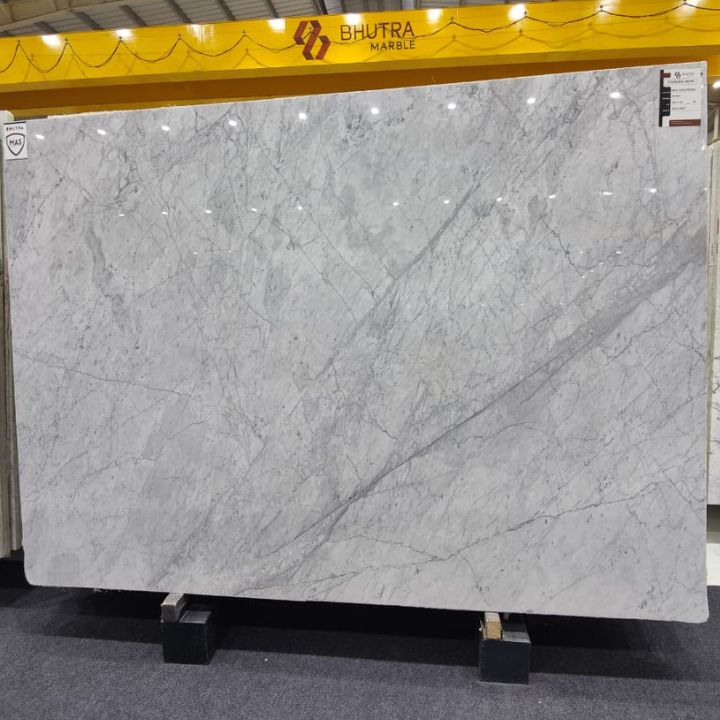Carrara marble slab with white base and grey veining available at Bhutra Marble Kishangarh